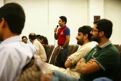 Attendees Interacting with Ali Shan